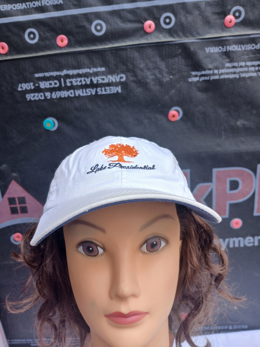 Lake Presidential White Baseball Cap with Orange Tree Logo
